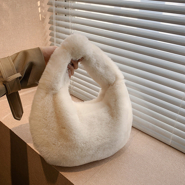 Fashionable winter hand held fluffy white bag