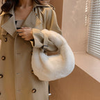 Fashionable winter hand held fluffy white bag