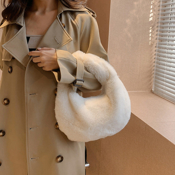 Fashionable winter hand held fluffy white bag